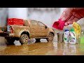 Washing dirty  miniature foton pickup truck after extreme offroading  diecast car