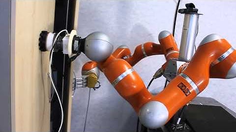 Dual-arm robot, with Two Kuka LWR arms, Opening and Closing a Door Using Modular Relative Jacobian