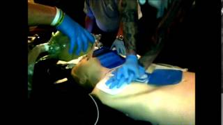Irish Red Cross - Demonstration of CPR, AED use, and ALS intervention in a cardiac event.