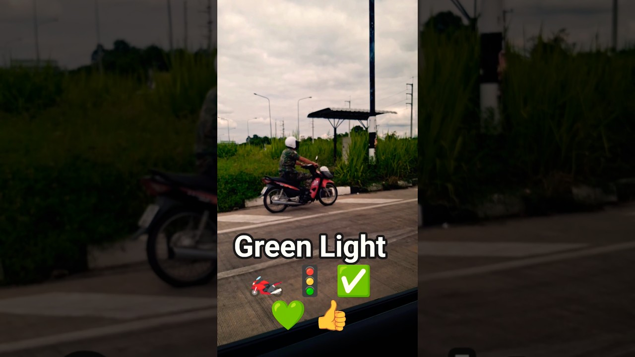 Khaki hero CRUISES through that green light like a boss 🏍️💨
