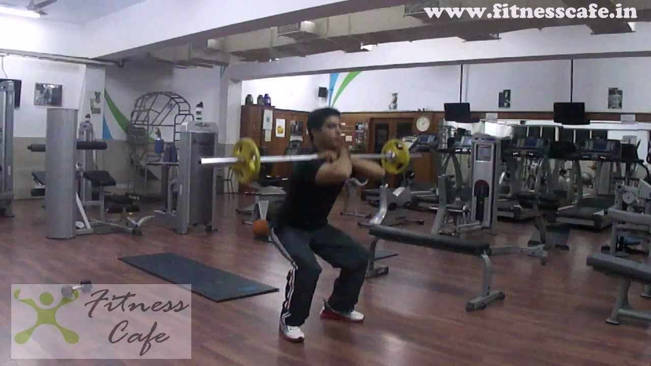 barbell front squat to target thigh muscle from fitness cafe gym