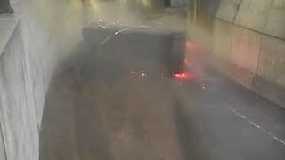 MassDOT video shows dump truck rollover on highway ramp in Boston