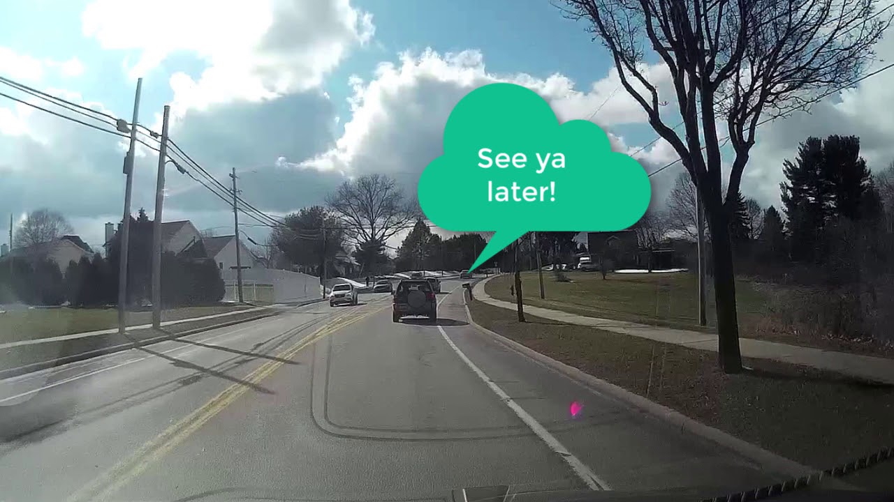Idiot driver passes on double yellow then runs a red light - YouTube