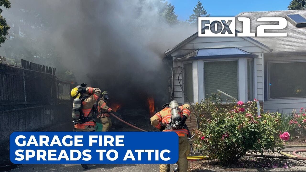 Garage fire spreads to attic in NE Portland house - YouTube