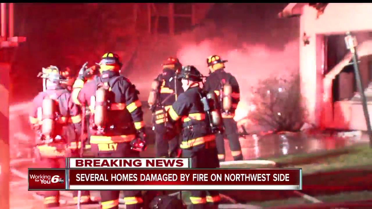 Fire damages three homes on Indianapolis' northwest side - YouTube