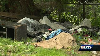 New Louisville homeowner frustrated by illegal dumping behind home