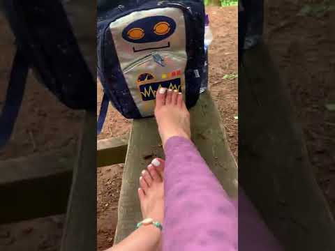 Earthing bare feet nature bench trees rocks