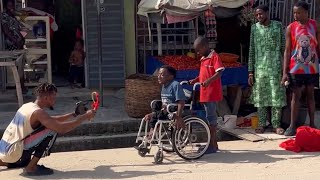 Strange stuff prank on Wheel chair man