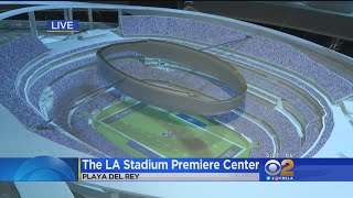 The stadium unveiled its massive premiere center with virtual models
of entire project, right down to suites, jumbotron and construction.