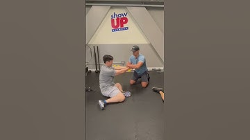 Trainer engaged PNF hip 90-90 / Shin Box mobility drills | Show Up Fitness the BEST certification