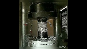 Carbon Fiber Confined concrete cylinder uniaxial compression - Explosion due to compression