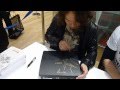 Yoji Shinkawa's Art & Hideo Kojima signing my PS3 at UNIQLO