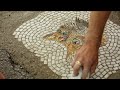 Artist's mosaics fill potholes with actual street art