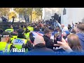 Police clash with protestors near Cenotaph in London during Armistice and pro-Palestine march