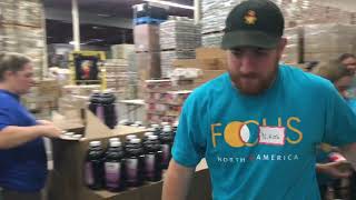 FOCUS So Cal & YAL serve at the CAPOC's Food Bank packing food boxes for low-income senior citizens.