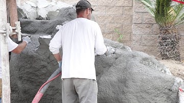 Applying mud pneumatically.  More sq footage faster!