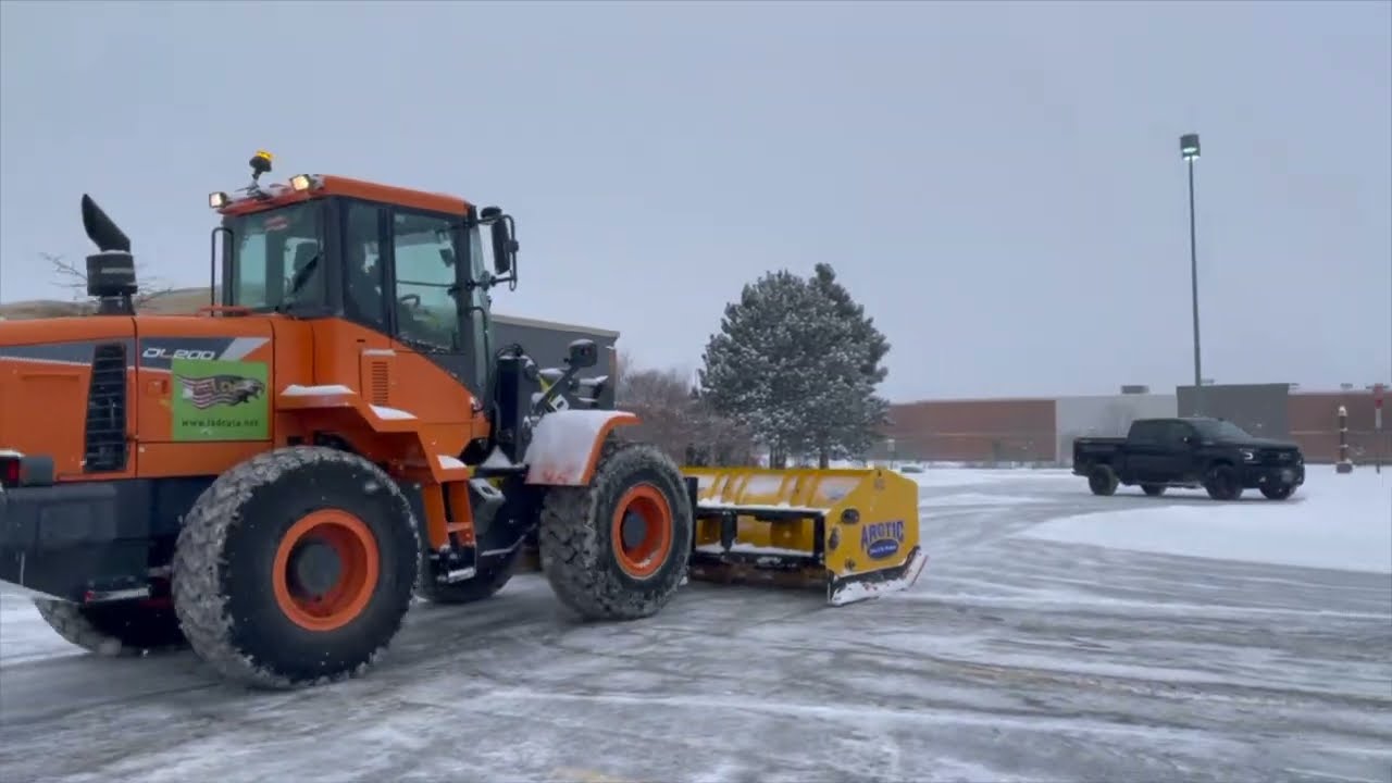 6 inches Arctic sectional snow pusher plowing snow