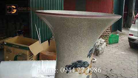 Lọ lộc bình men rạn đắp nổi công đào 1m4