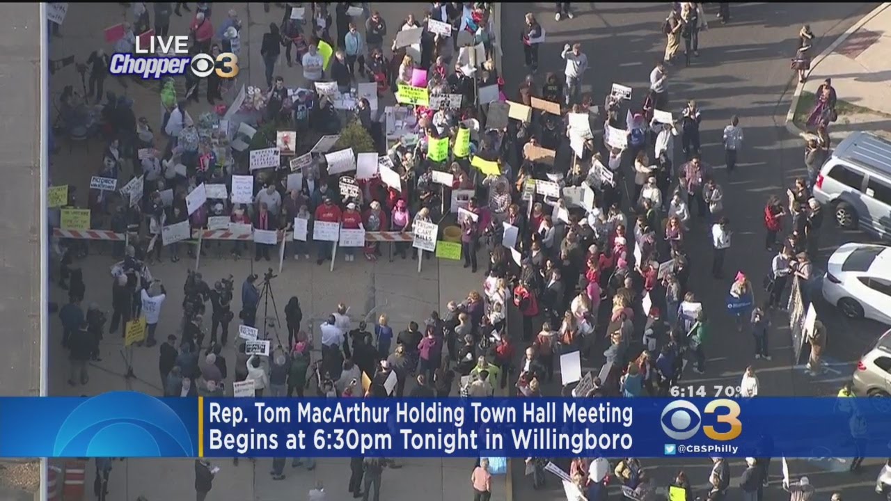 Demonstrators Gather Ahead of Rep. Tom MacArthur's Town Hall