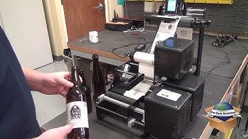 Label and code bottles with ease - Bottle-Matic Total Solution