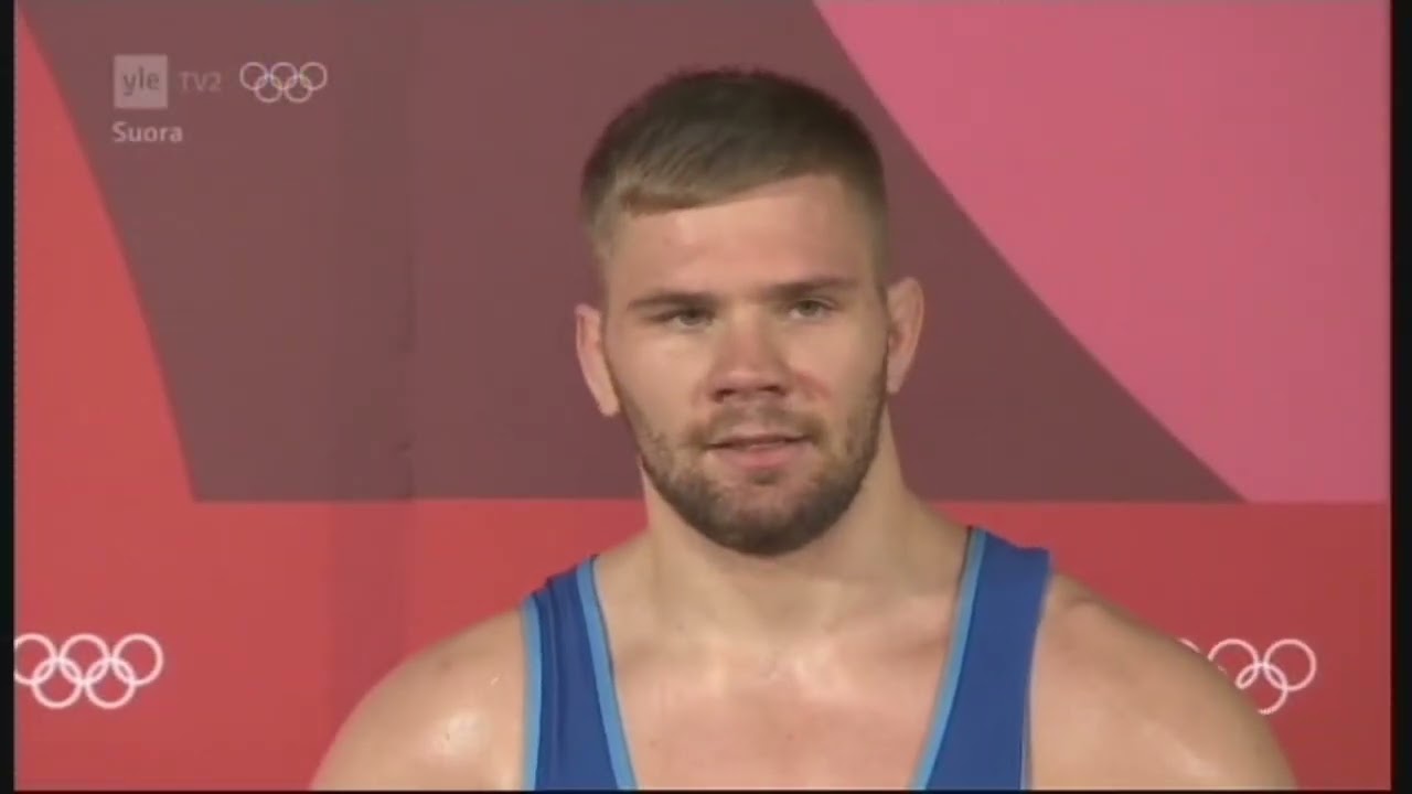 Olympiakisat Tokio 2021 Elias Kuosmanen georgialaista vastaan hävityn painiottelun jälkeen