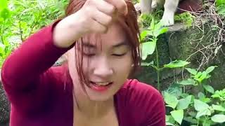Fishing Video/beautiful hook fishing girl catches fish and cook in the wild with her pet