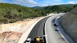 China's C.H.E.C, Engineers Makes Highway Construction Looks Easy. St. Thomas Jamaica New Highway.