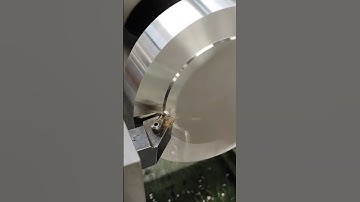 facing off stainless steel part #machine #machinist #lathe #chips #cazeneuve #machineshop