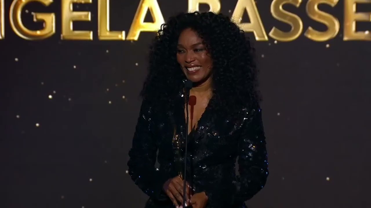 Tenoch Huerta Mejía Presents Angela Bassett with the Acting Achievement Award at the HCA Film Awards