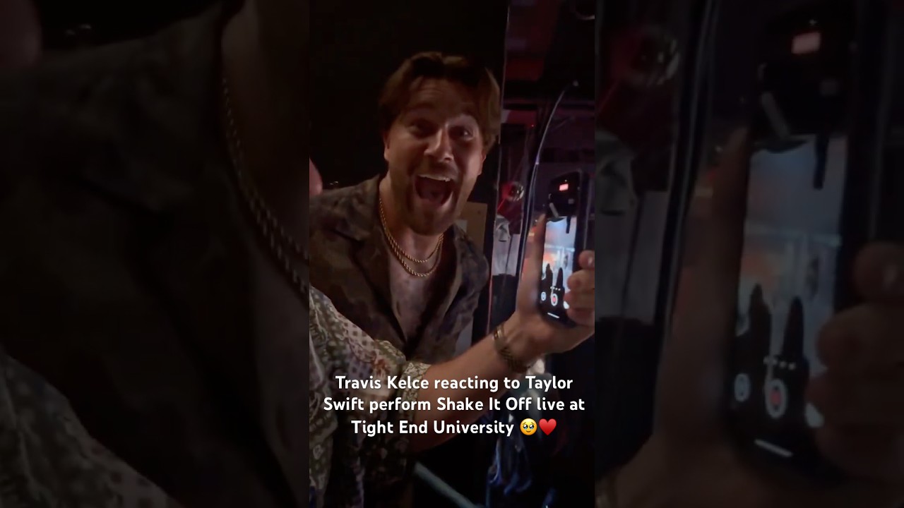 Travis Kelce reacting to Taylor Swift perform Shake It Off live at 
