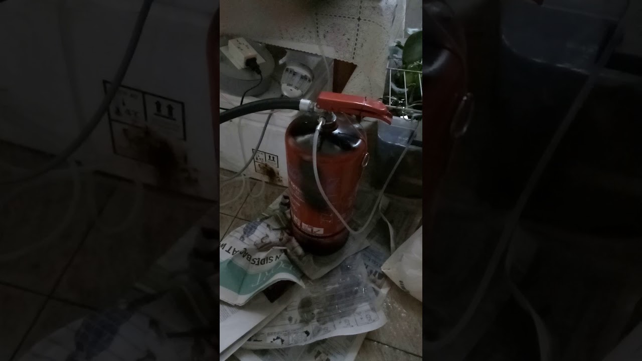 Used Fire extinguisher converted to useful air pump and ...