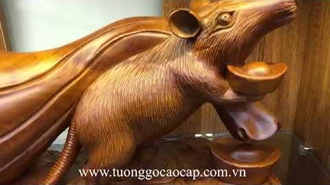 Tượng chuột kéo bao tiền gỗ hương