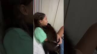 Loving Monkey Comforts a Girl Thinking She’s Sad