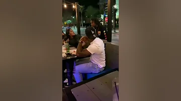Guy catches baby mama out with another dude having a meal and spazzes‼️