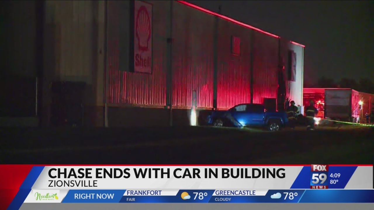 Police pursuit ends with vehicle crashing into building - YouTube