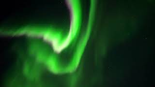 Epic Northern Lights Dancing in the Sky over Arctic Wilderness in Rovaniemi
