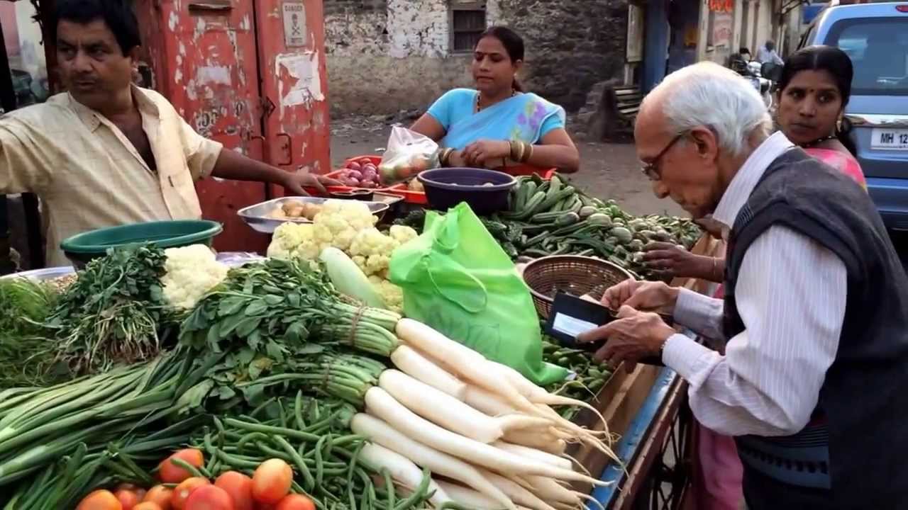 Papa buying vegetables in Pune from street-side vendor - his hobby.