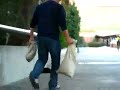 People help baby squirrel climb a wall Video