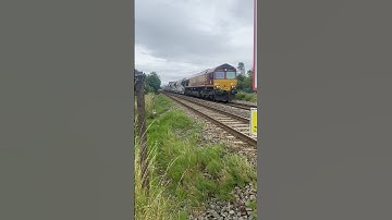 Class 66 operated by DB Cargo; 66063 in EWS livery. 26/07/2025.