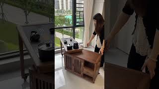 Unfold rotating tea table with cabinet doors – both aesthetically pleasing and space-saving....