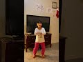 Mimi is dancing at home