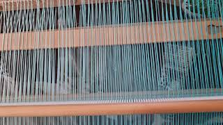 cutting shawl off the loom
