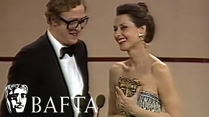 Audrey Hepburn presents Michael Caine with his BAF...