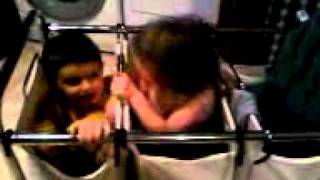 20081212 harpanddan in clothes hamper
