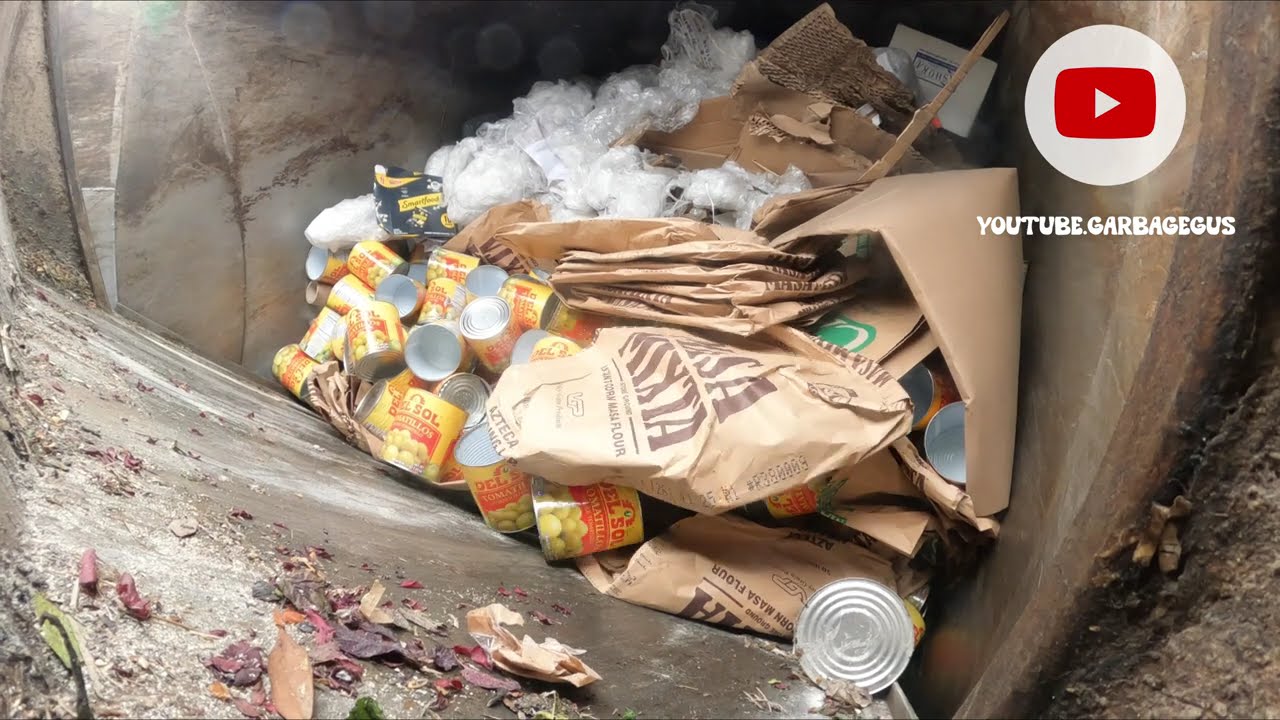 Waste Management front load recycling truck packer