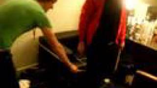 The Wombats' Dan Haggis hits Murph with a drum stick