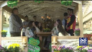 Holyoke Grand Colleen and her court sees float they will ride on in the St. Patrick's Parade
