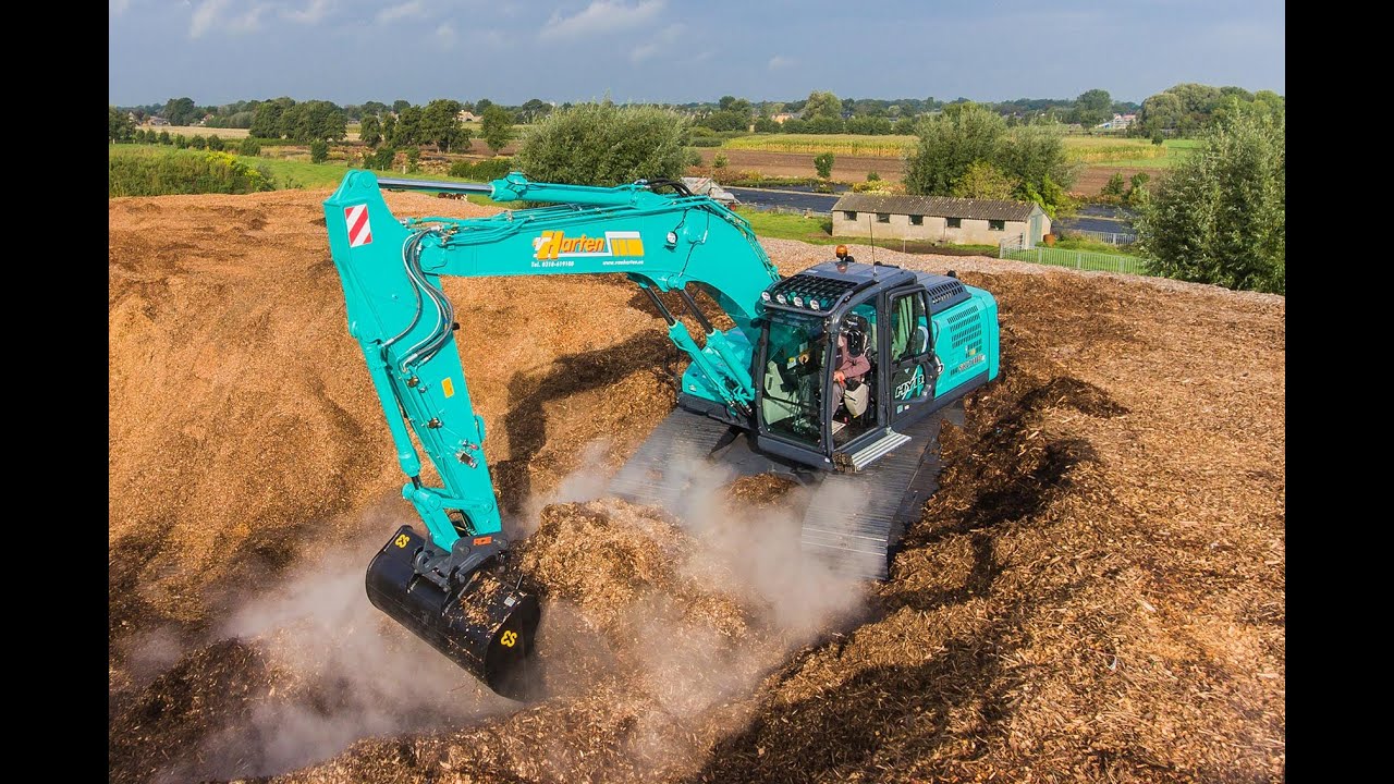 Hybride Kobelco SK210HLC-10 voor Van Harten