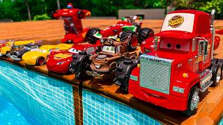 Disney Pixar Cars falling into deep pool, Lightning McQueen, Tow Mater, Mack, Sally, Francesco