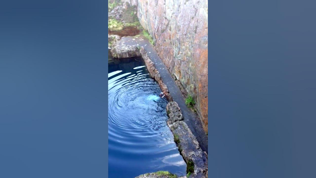 Near death cliff jump at blue lake Friog in Wales - YouTube
